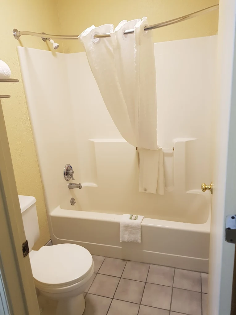 Bathroom with tub and shower combination